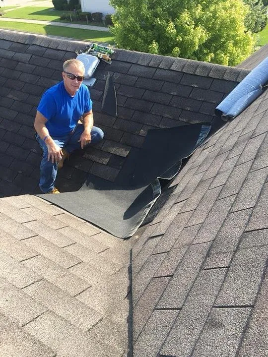 Slide of Jim's Roofing