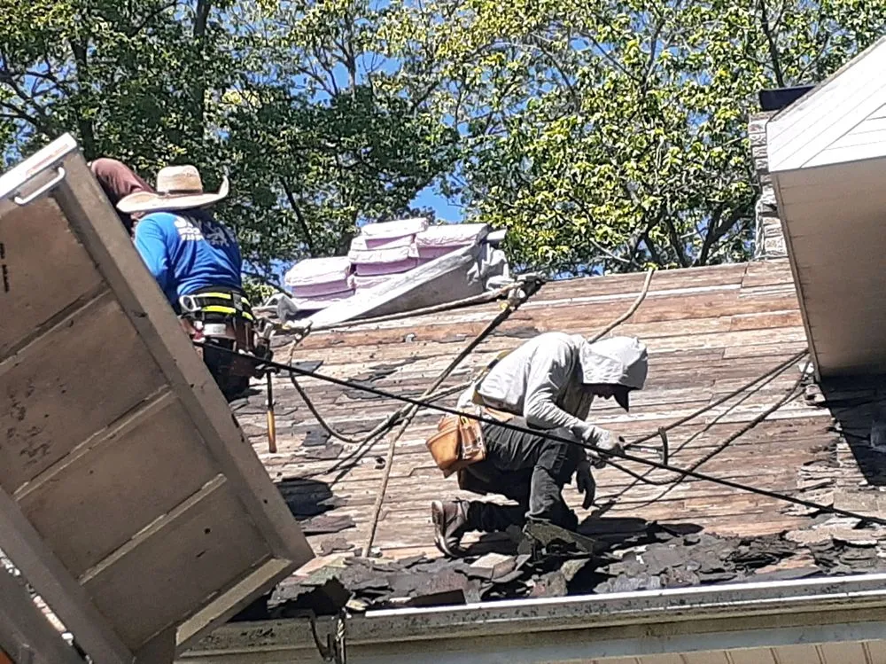 Slide of Jim's Roofing