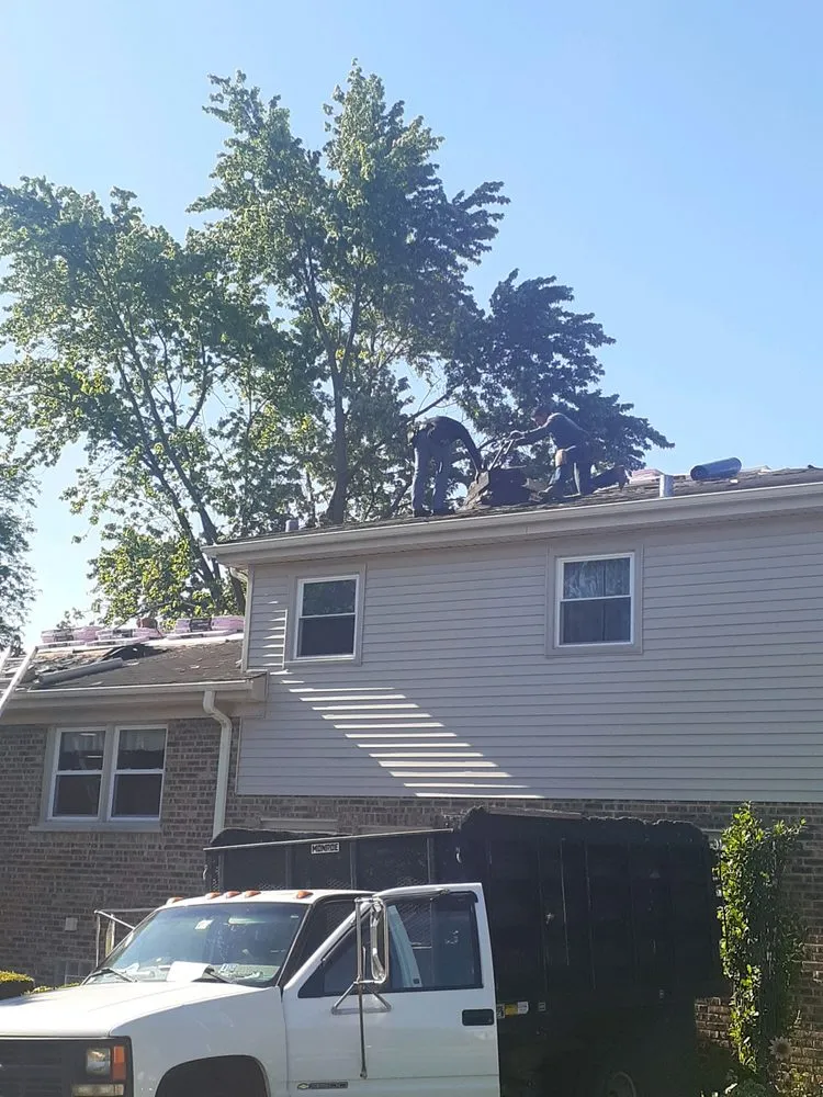 Slide of Jim's Roofing