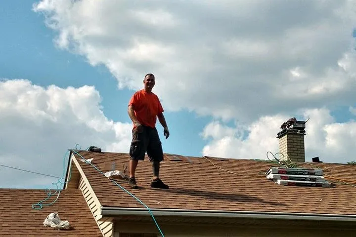 Slide of Jim's Roofing