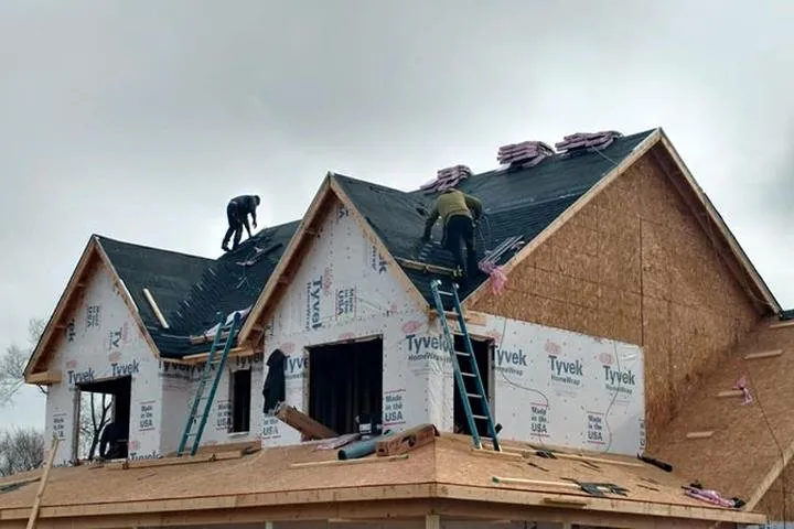 Slide of Jim's Roofing