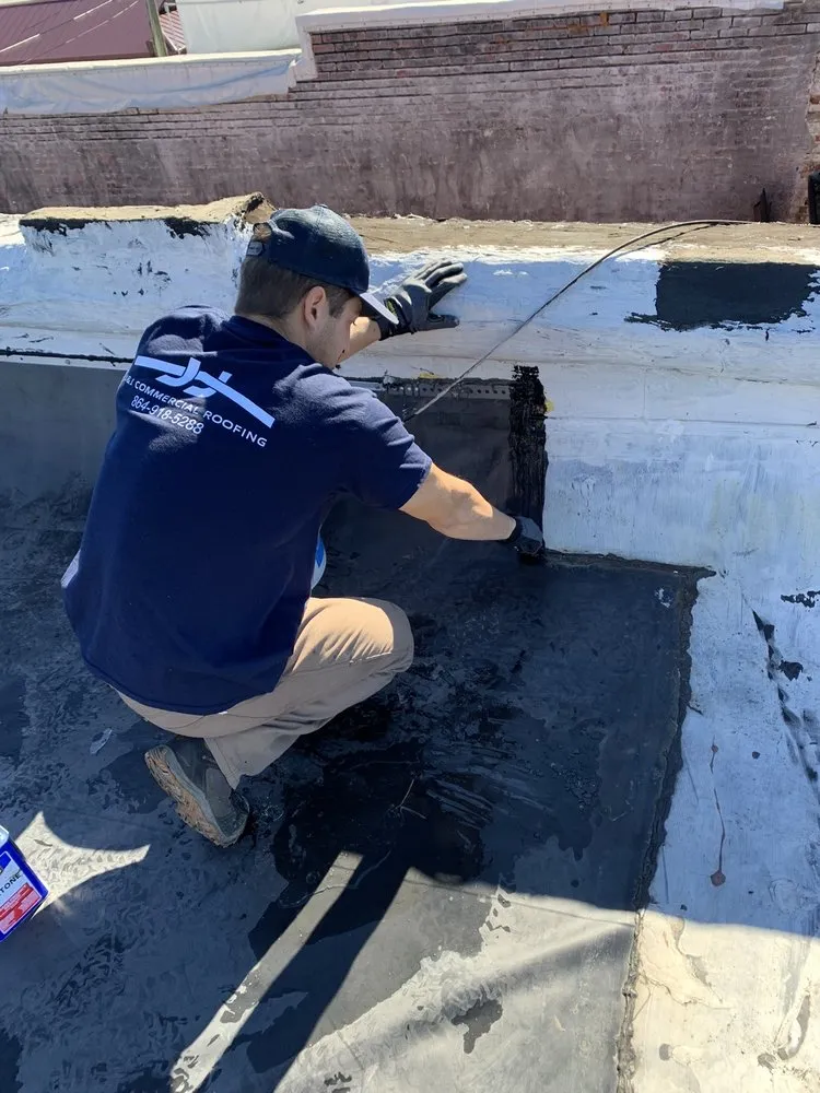 Slide of J&J Commercial Roofing