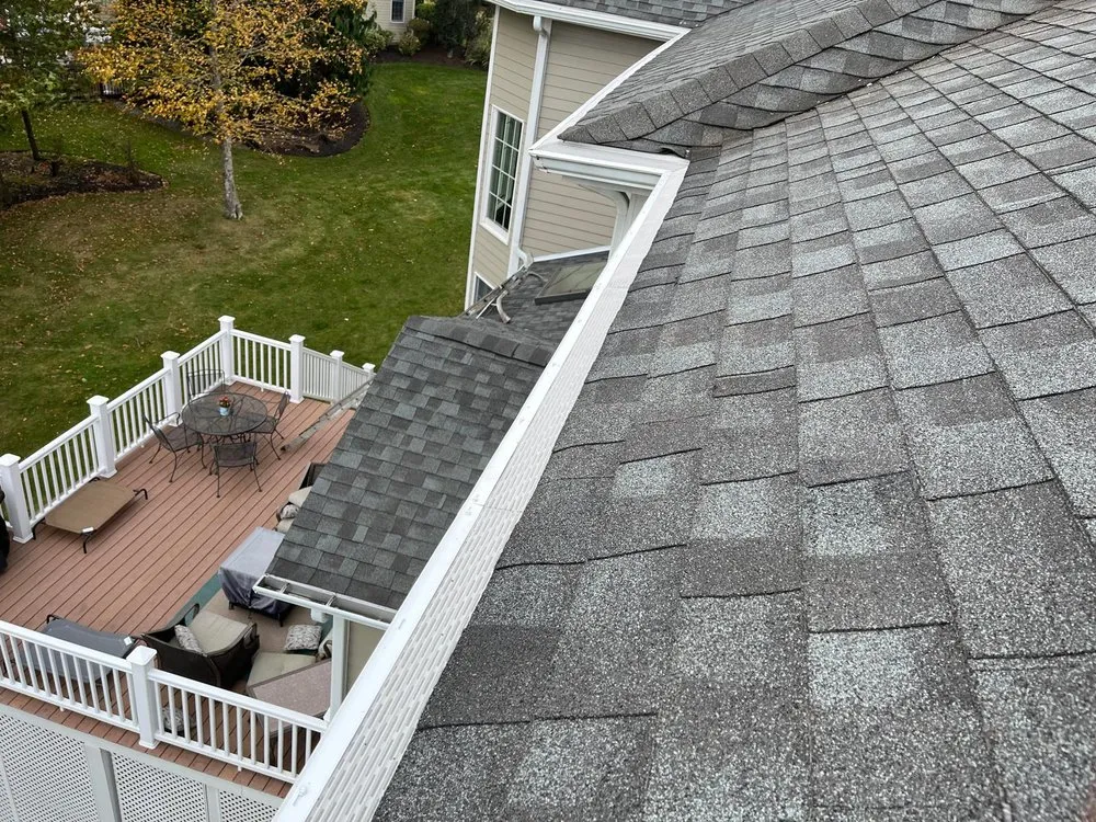 Slide of JJ Gutters And Power Washer