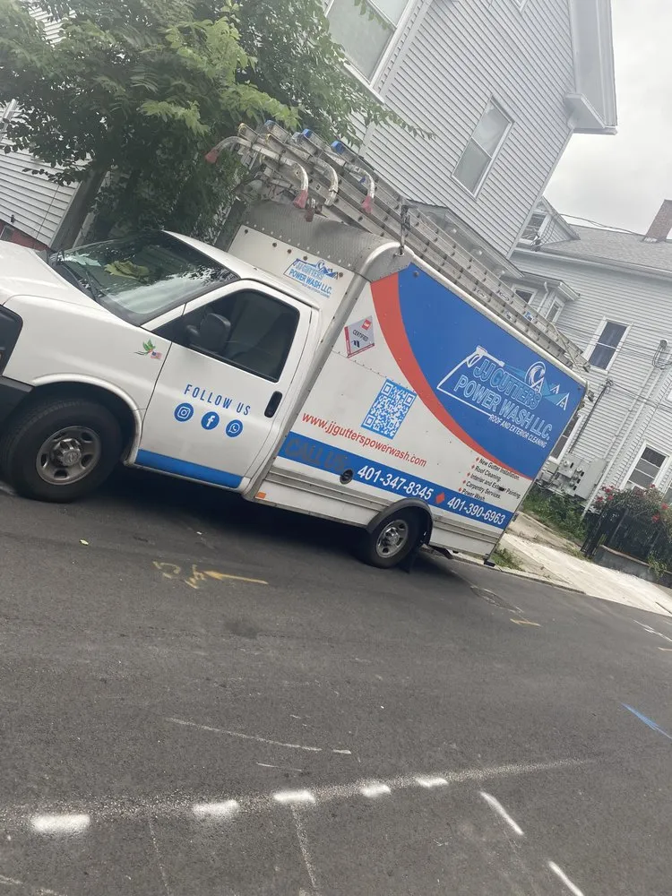 Slide of JJ Gutters And Power Washer