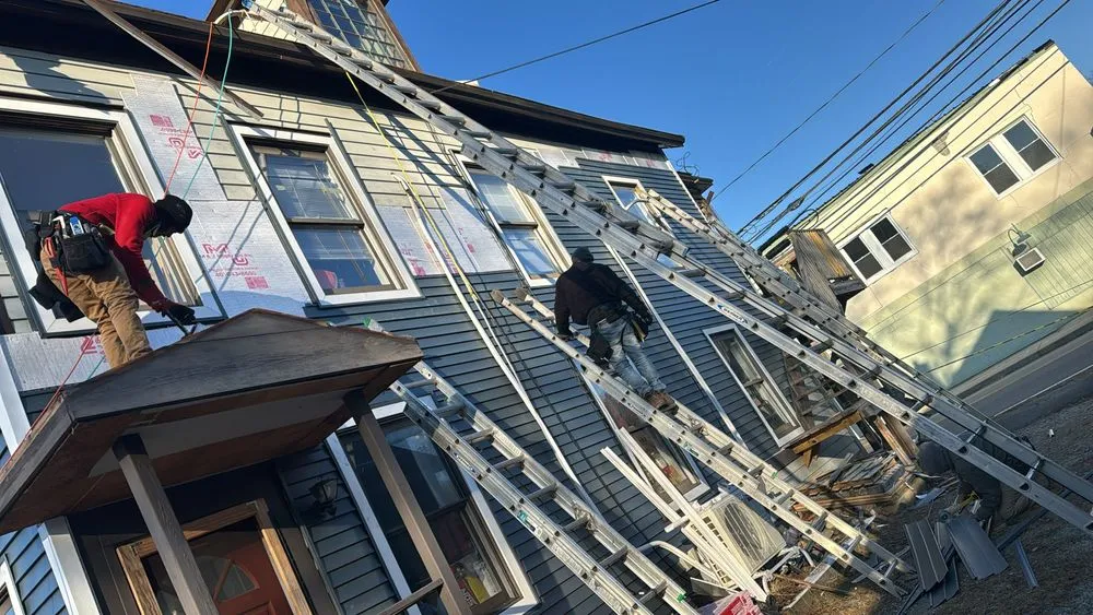 Slide of JJ Gutters And Power Washer