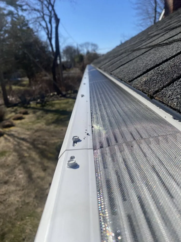 Slide of JJ Gutters And Power Washer