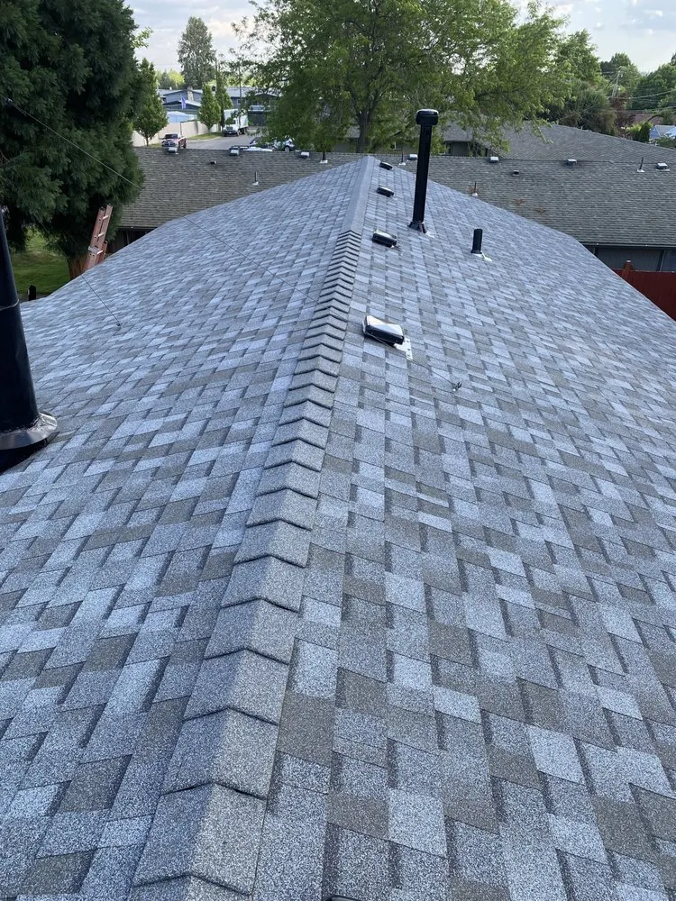 Slide of JJ New Era Roofing