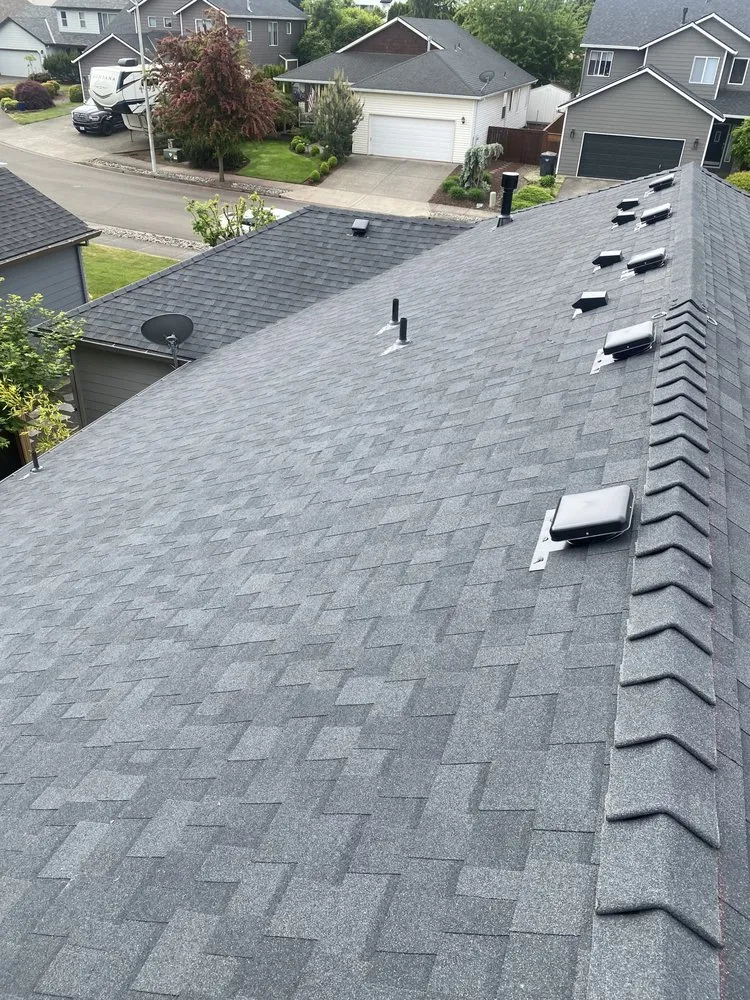 Slide of JJ New Era Roofing