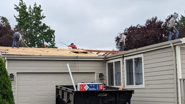 J&J Roofing & Construction Logo