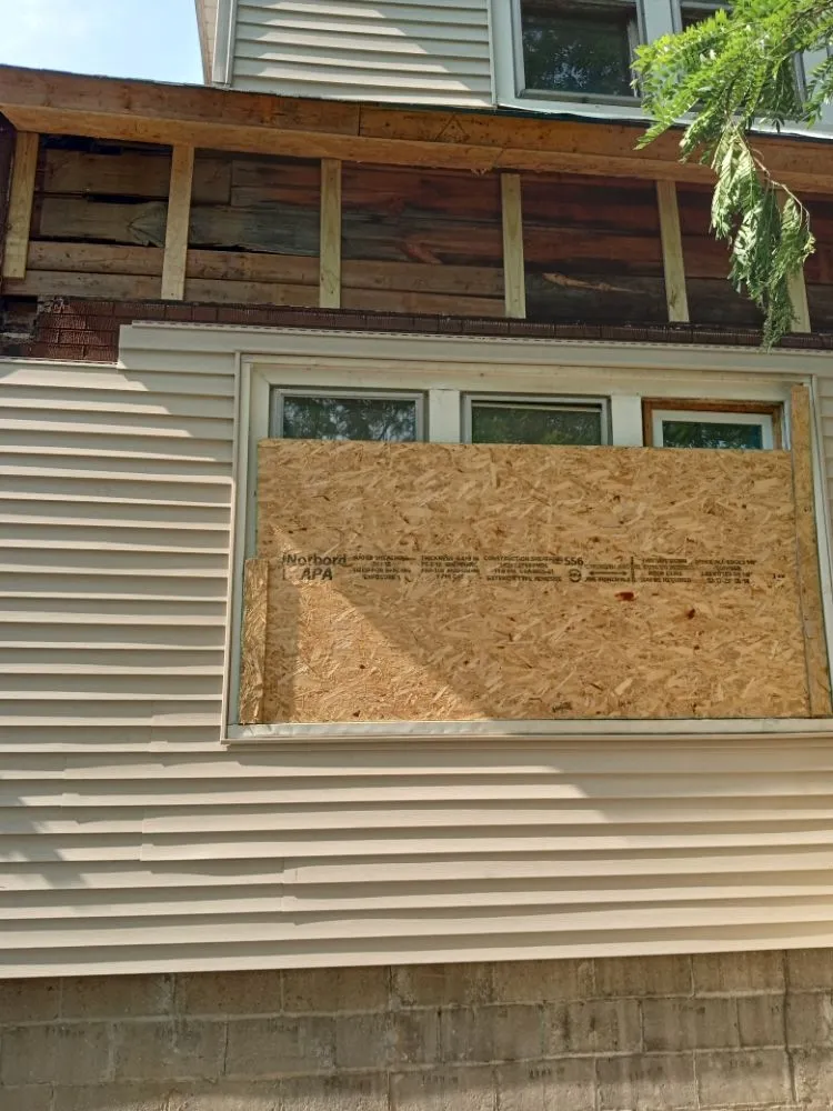 Slide of J&J Roofing Authority