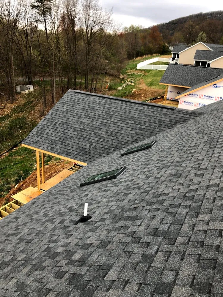 Slide of J&J Roofing