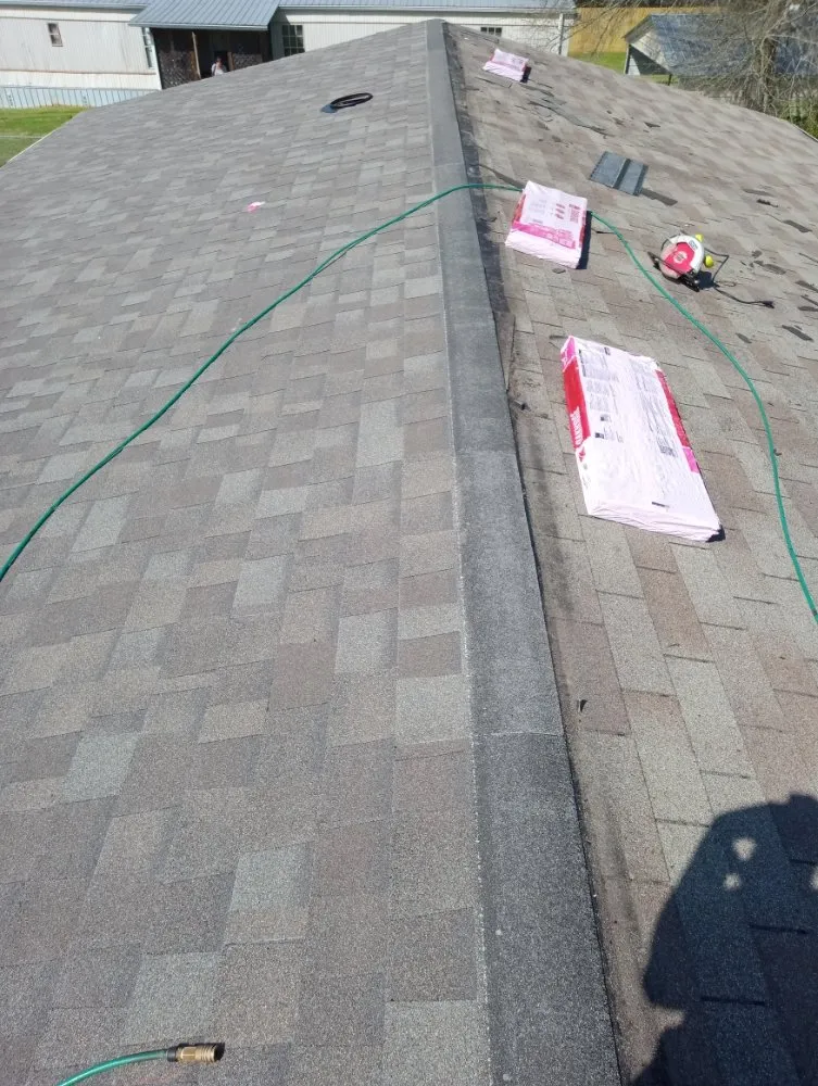 Slide of J&J Roofing