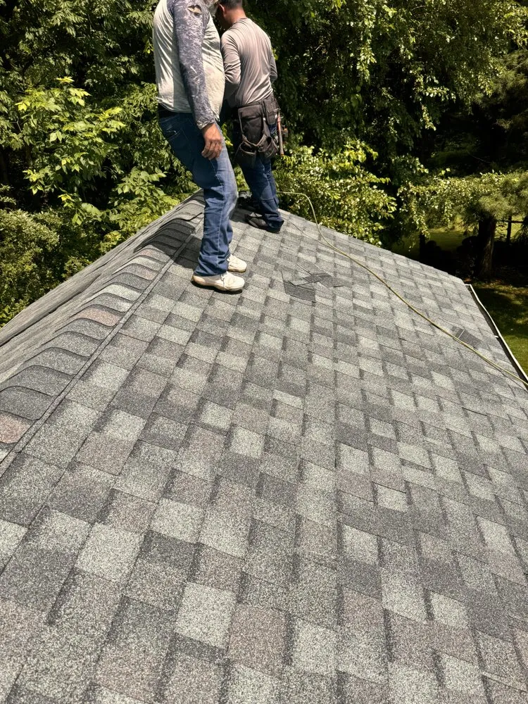 Slide of JK Ortiz Roofing