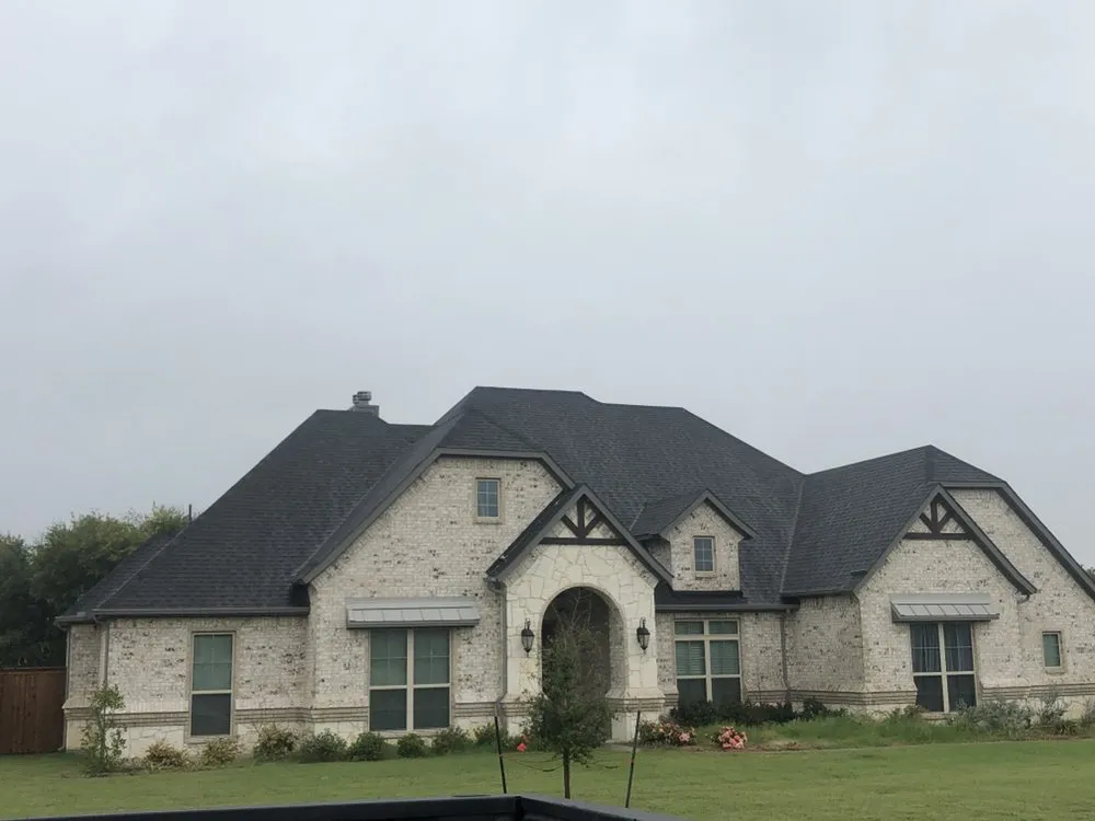 Slide of J&K Roofing and Construction