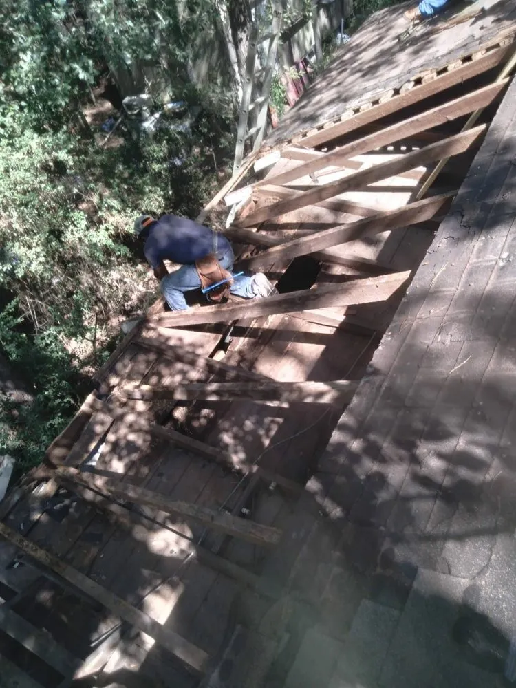 Slide of J&K Roofing Company