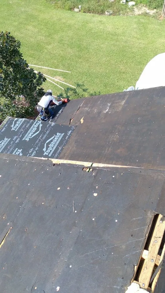 Slide of J&K Roofing Company