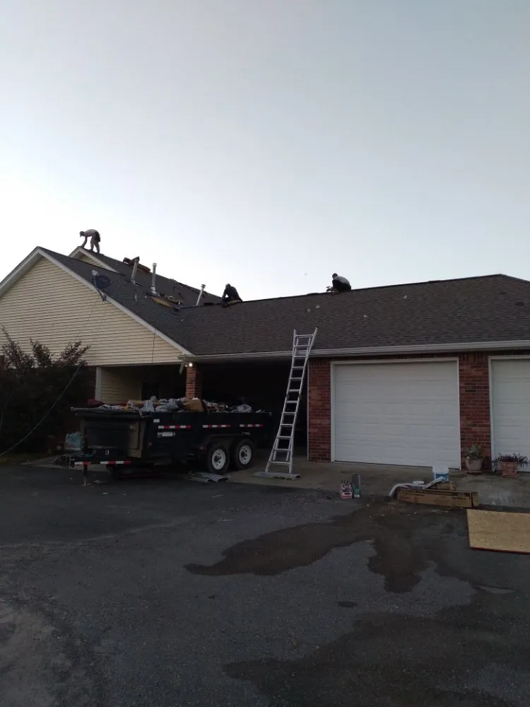 Slide of J&K Roofing Company