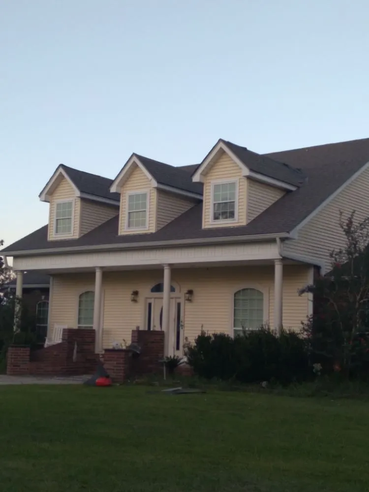 Slide of J&K Roofing Company