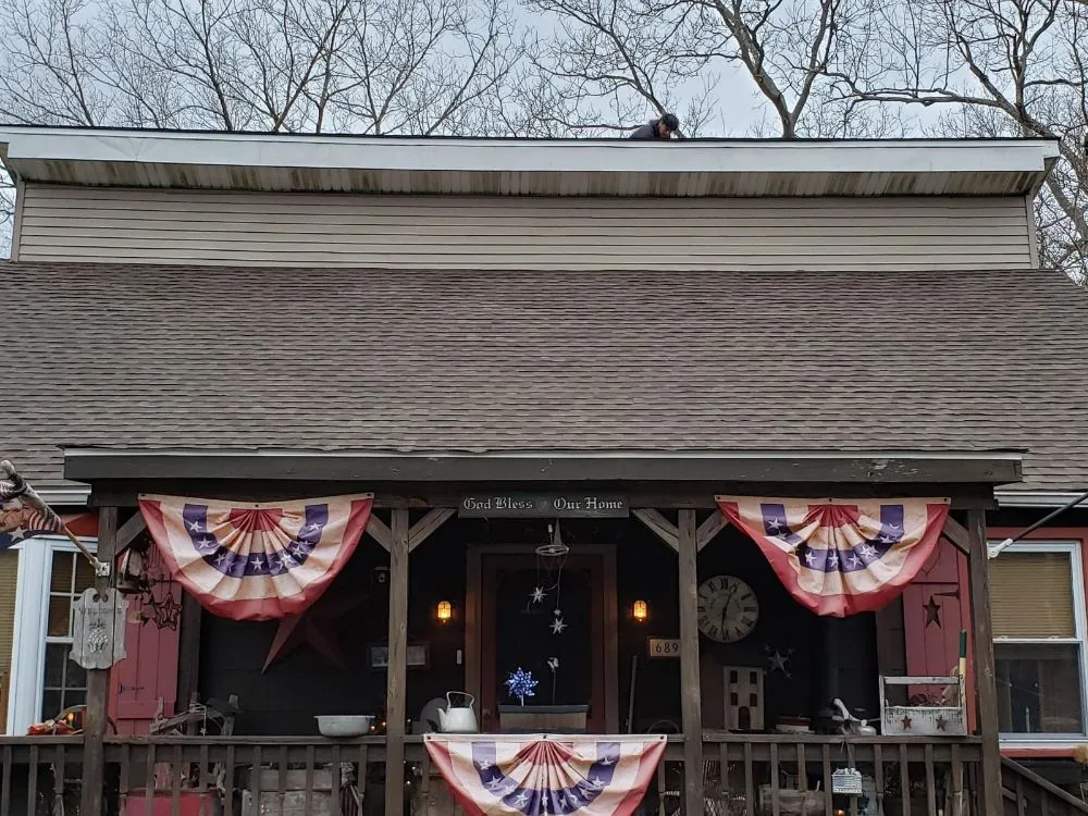 Slide of JL Construction Roofing