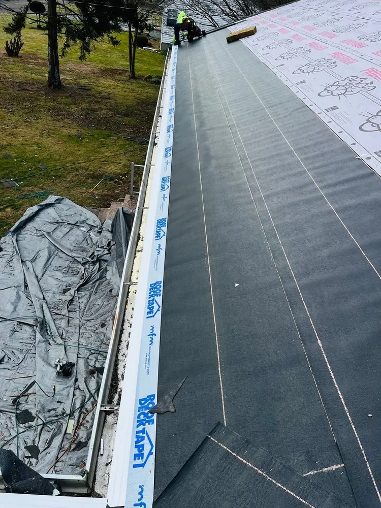 Slide of JLeo Roofing