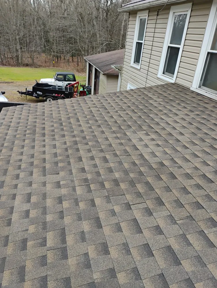 Professional flat roof repair experts serving Beech Creek, PA - Jm Construction