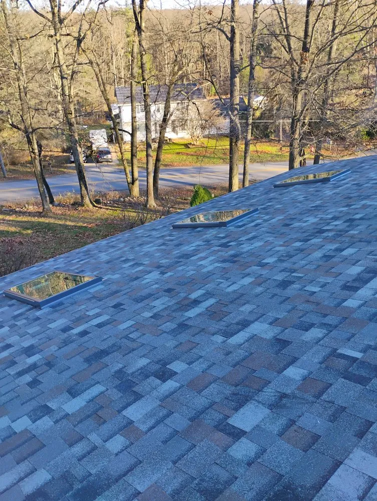 Licensed shingle roofing service for homes in Beech Creek, PA by Jm Construction