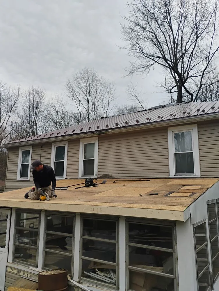 Expert flat roof repair after storm damage across Beech Creek, PA - Jm Construction