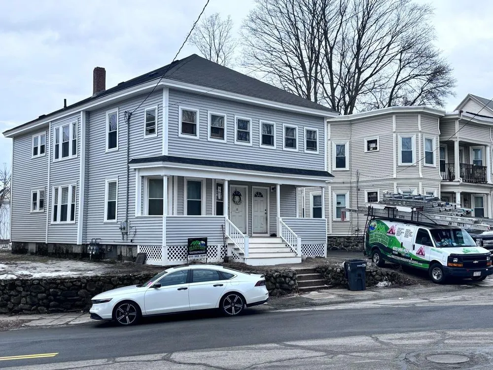 Slide of JM Exteriors Roofing Siding