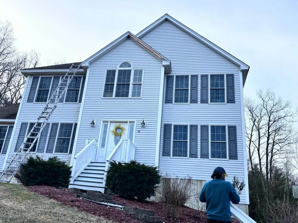 Slide of JM Exteriors Roofing Siding