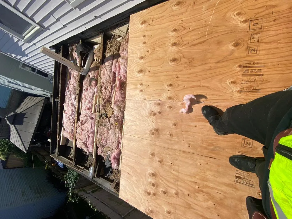 Slide of JM Exteriors Roofing Siding