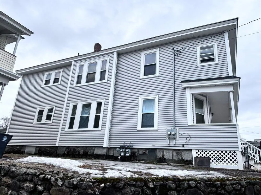 Slide of JM Exteriors Roofing Siding