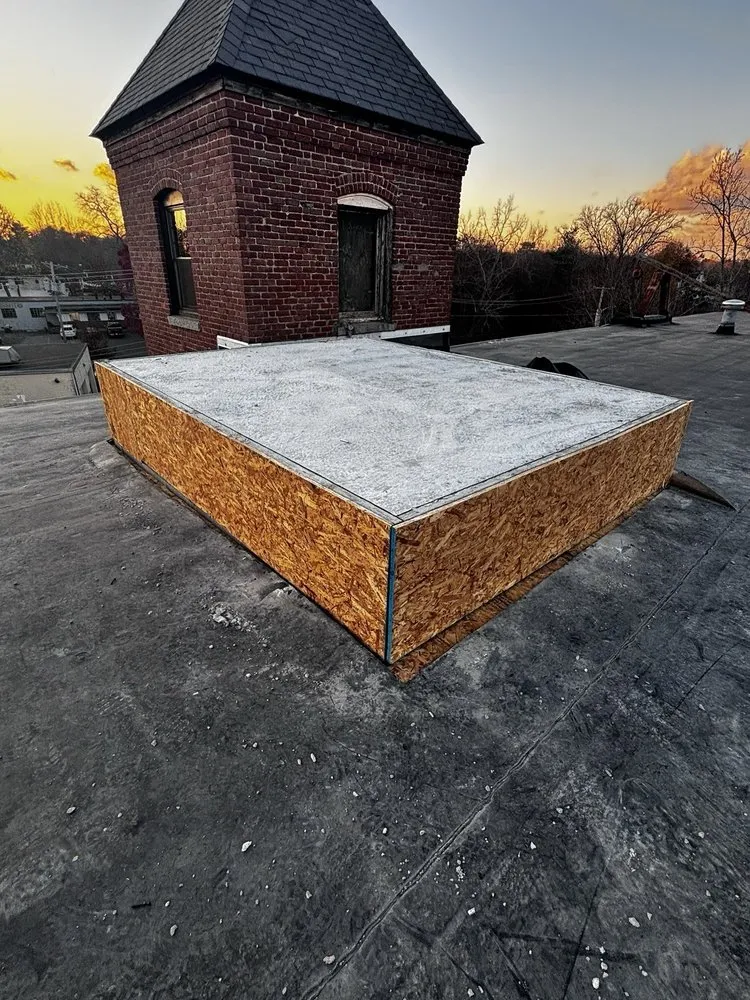 Slide of JM Exteriors Roofing Siding