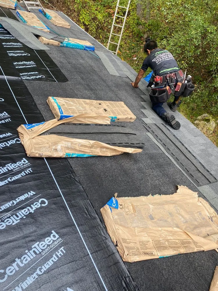 Slide of JM Exteriors Roofing Siding