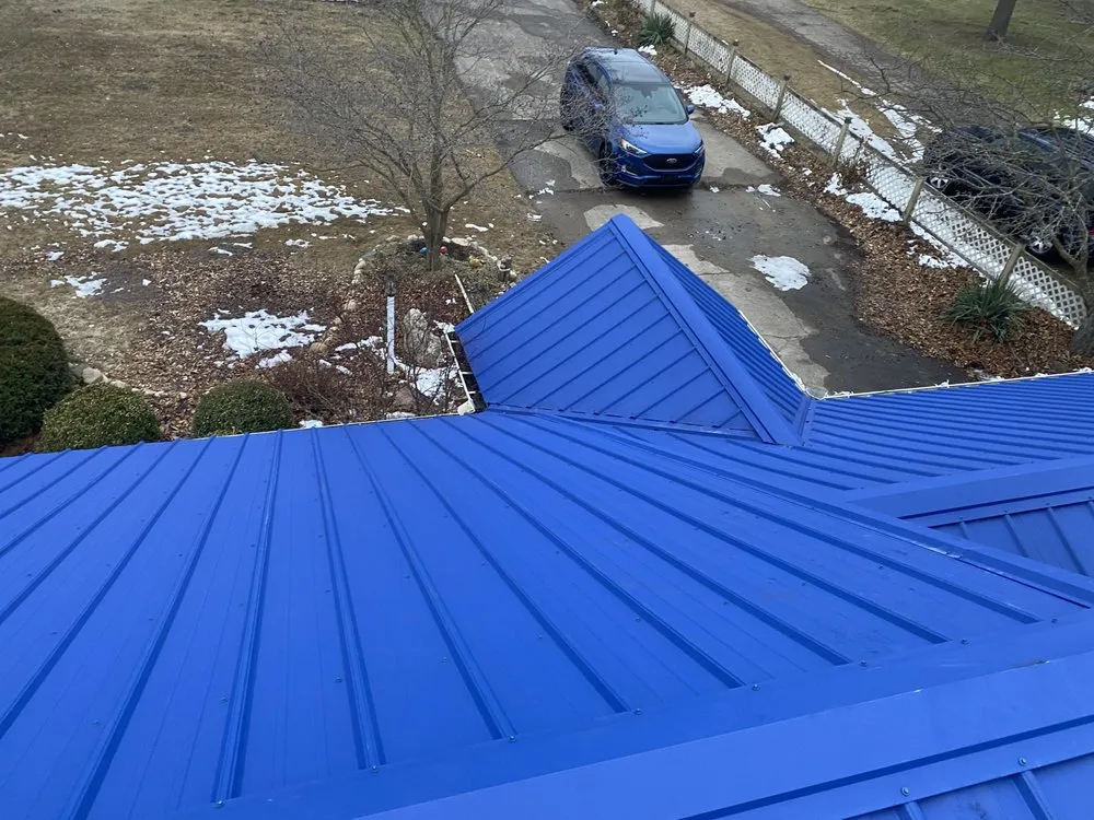 Slide of J&M Metal Roofing and Siding