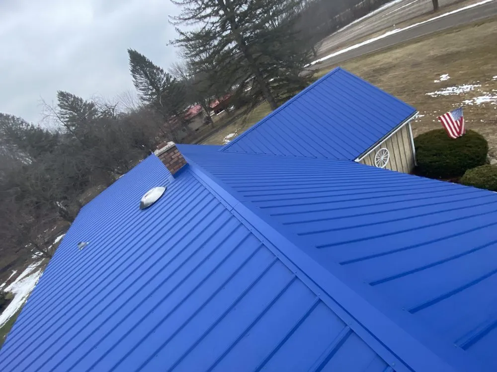 Slide of J&M Metal Roofing and Siding