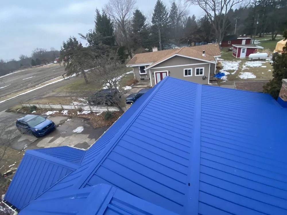 Slide of J&M Metal Roofing and Siding