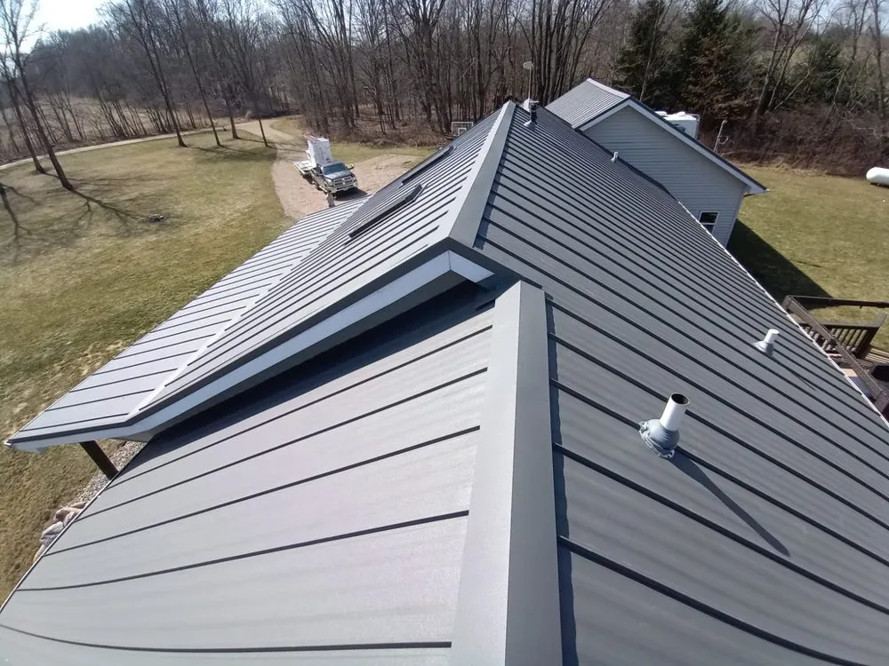 Slide of J&M Metal Roofing and Siding