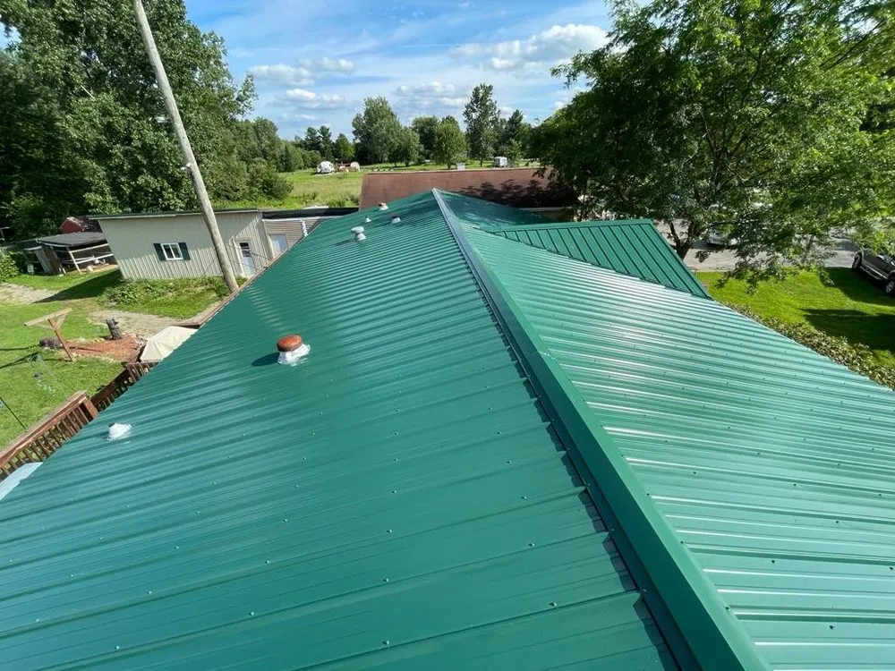 Slide of J&M Metal Roofing and Siding