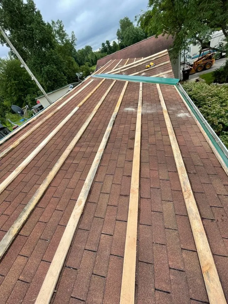 Slide of J&M Metal Roofing and Siding