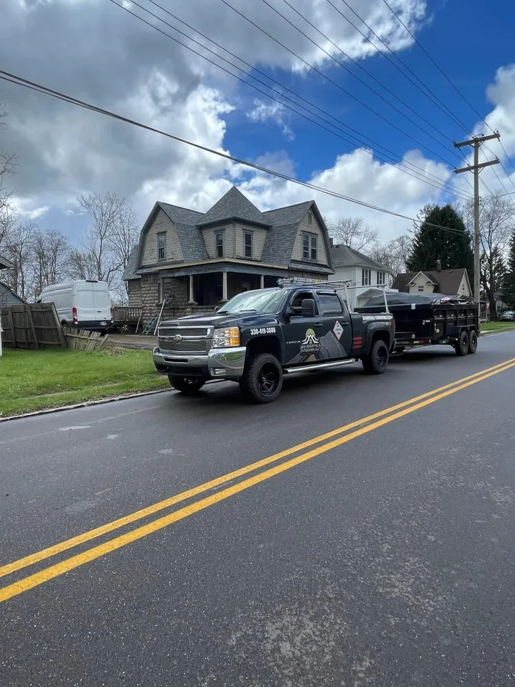 Slide of J&M Roofing & Exteriors