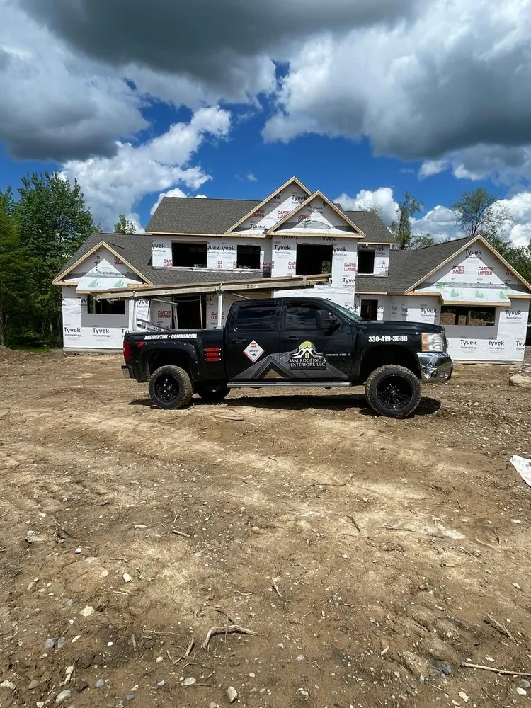 Slide of J&M Roofing & Exteriors