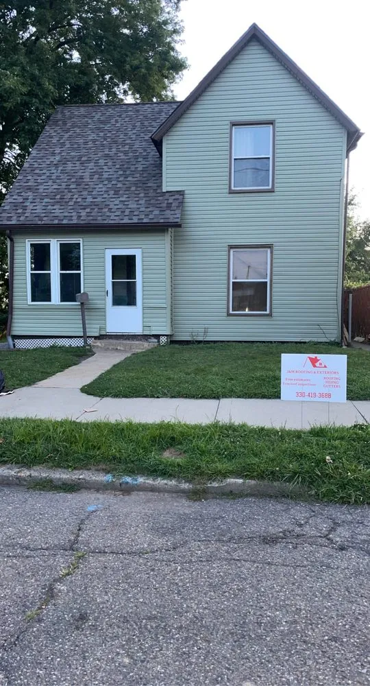 Slide of J&M Roofing & Exteriors