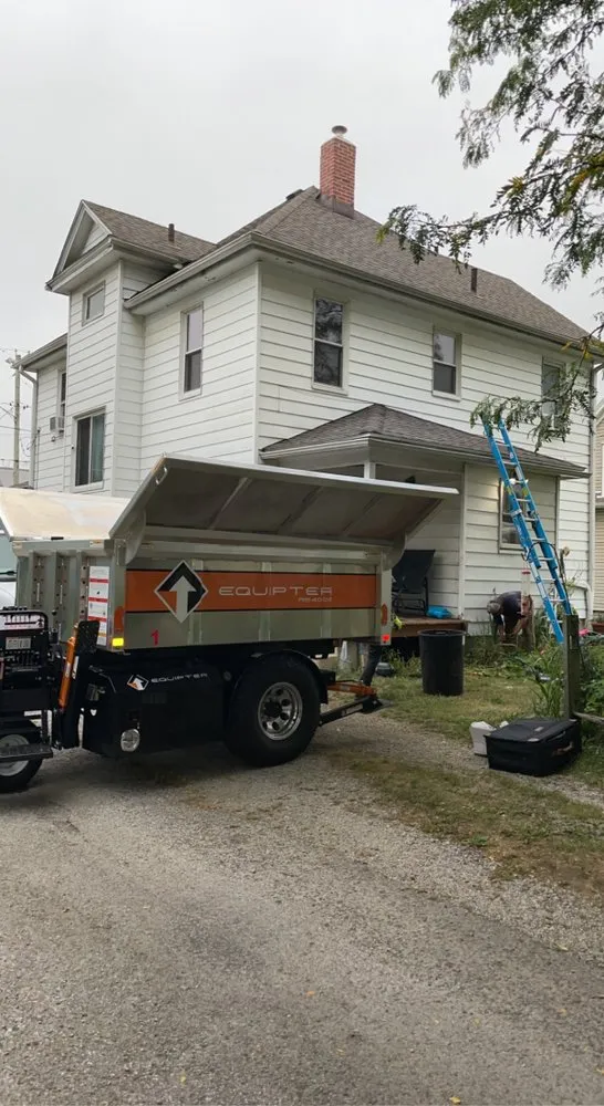 Slide of J&M Roofing & Exteriors