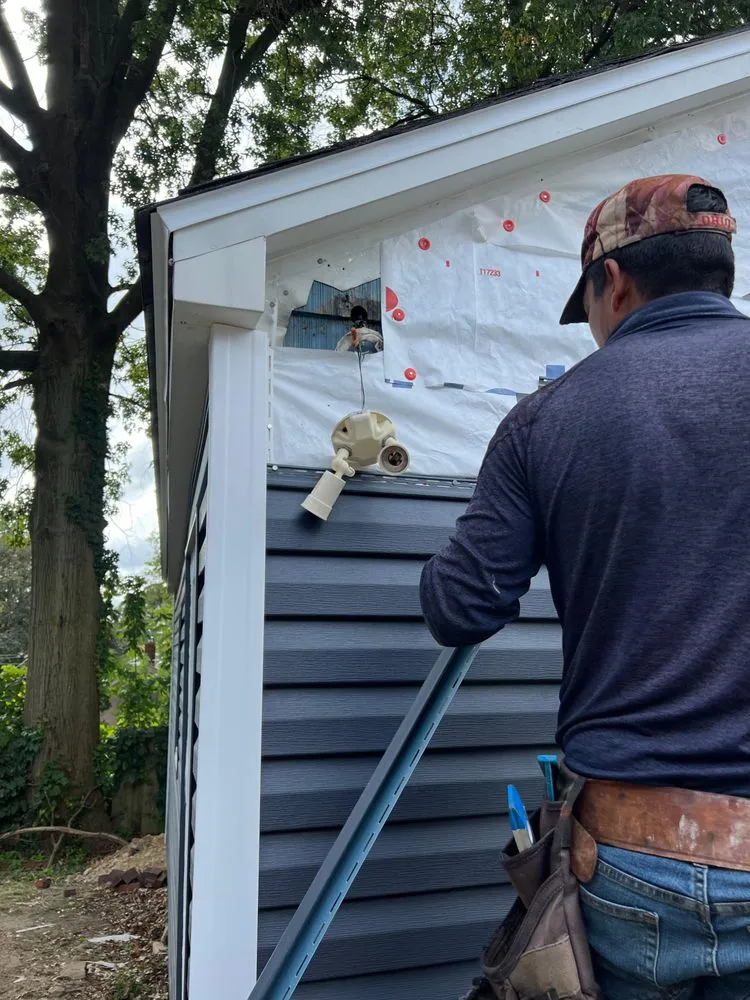 Slide of J&M Roofing & Exteriors