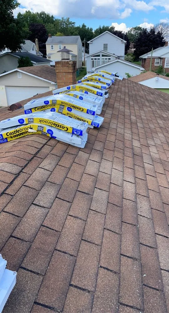 Slide of J&M Roofing & Exteriors