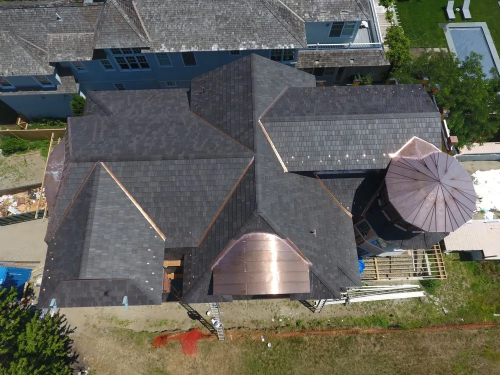 Slide of JM Roofing & Siding