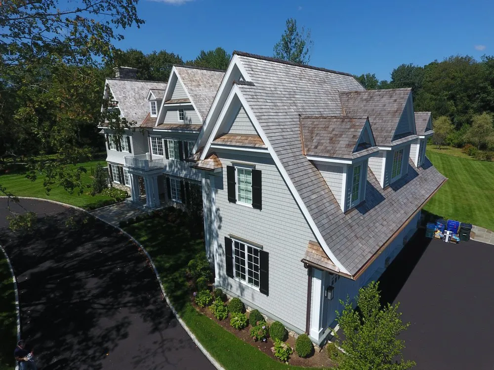 Slide of JM Roofing & Siding