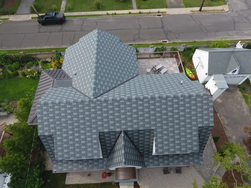 Slide of JM Roofing & Siding