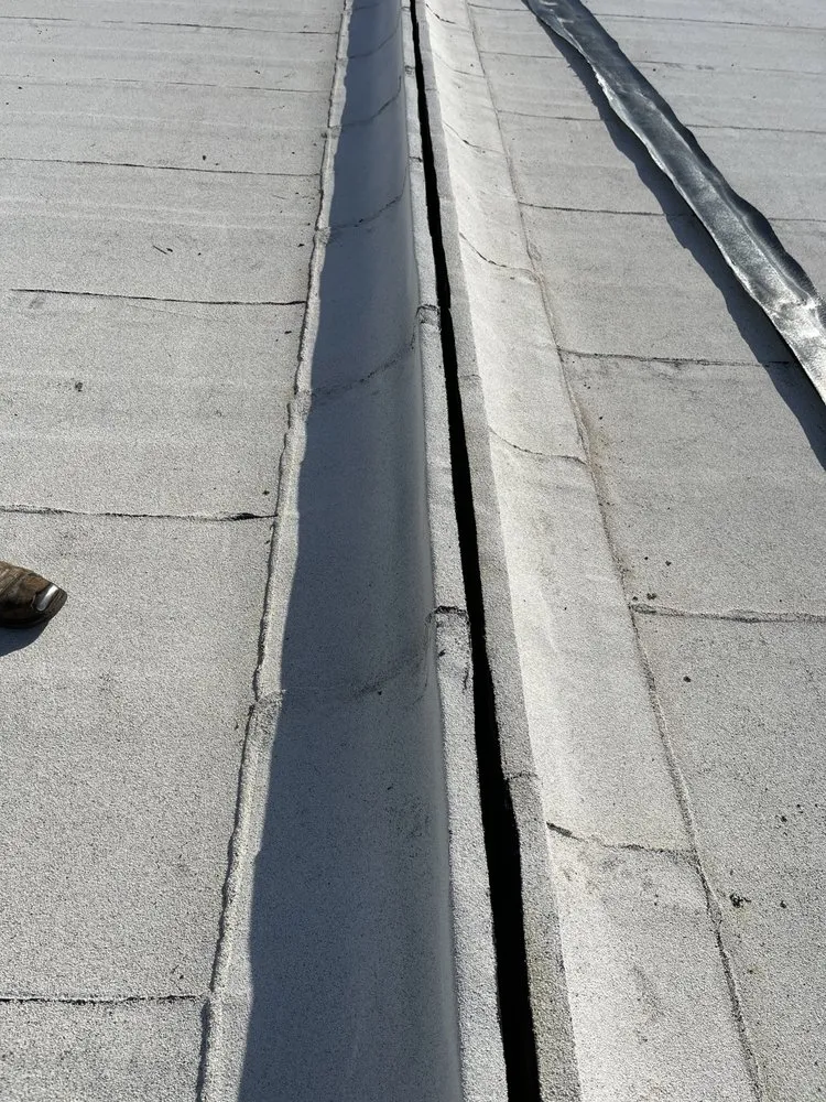 Slide of JM Roofing and Construction