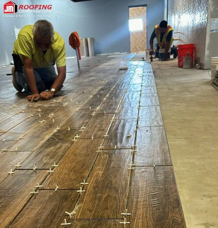 Slide of JM Roofing Construction